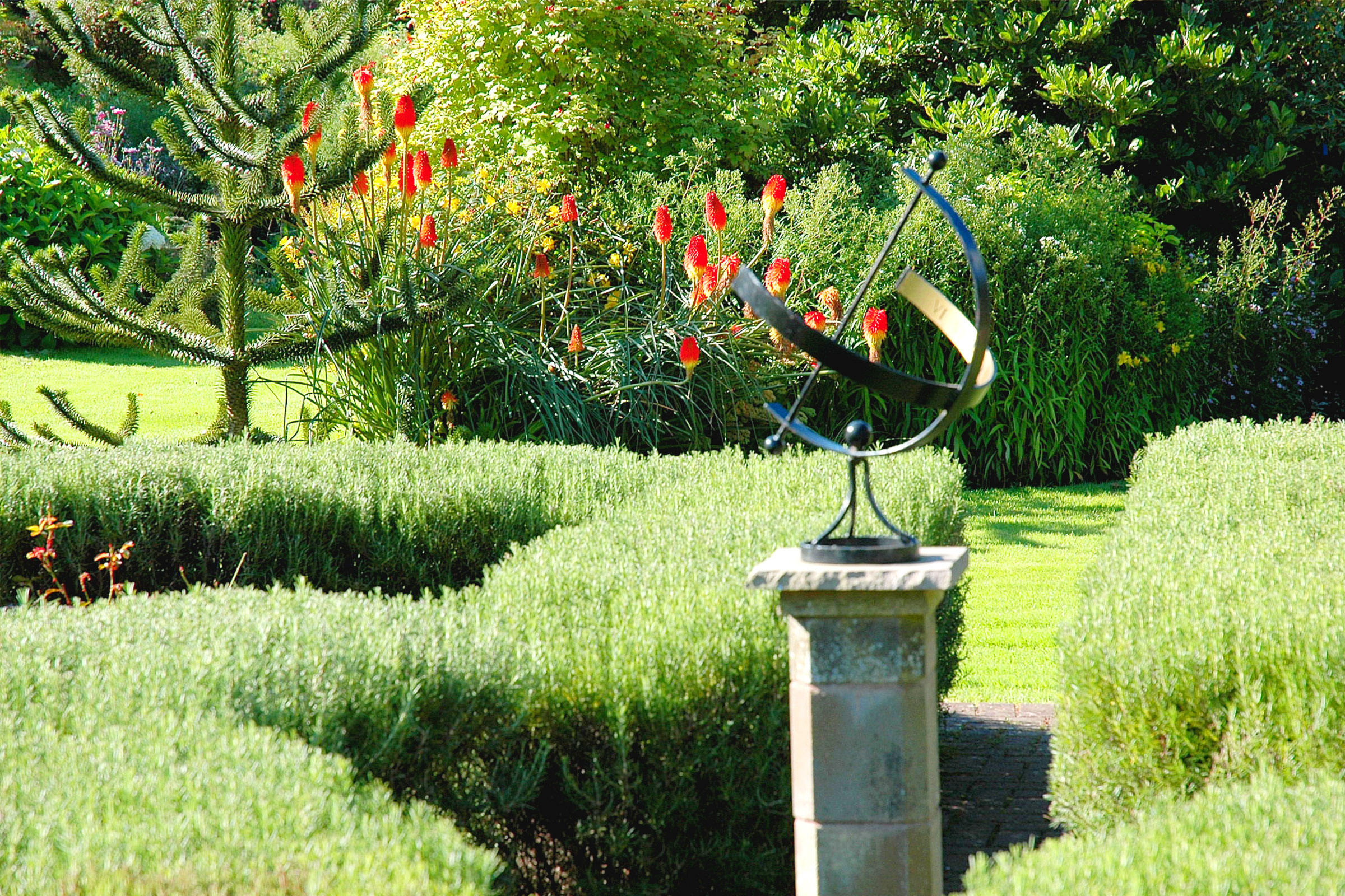 View of sundial in the gardens at Westcott Barton